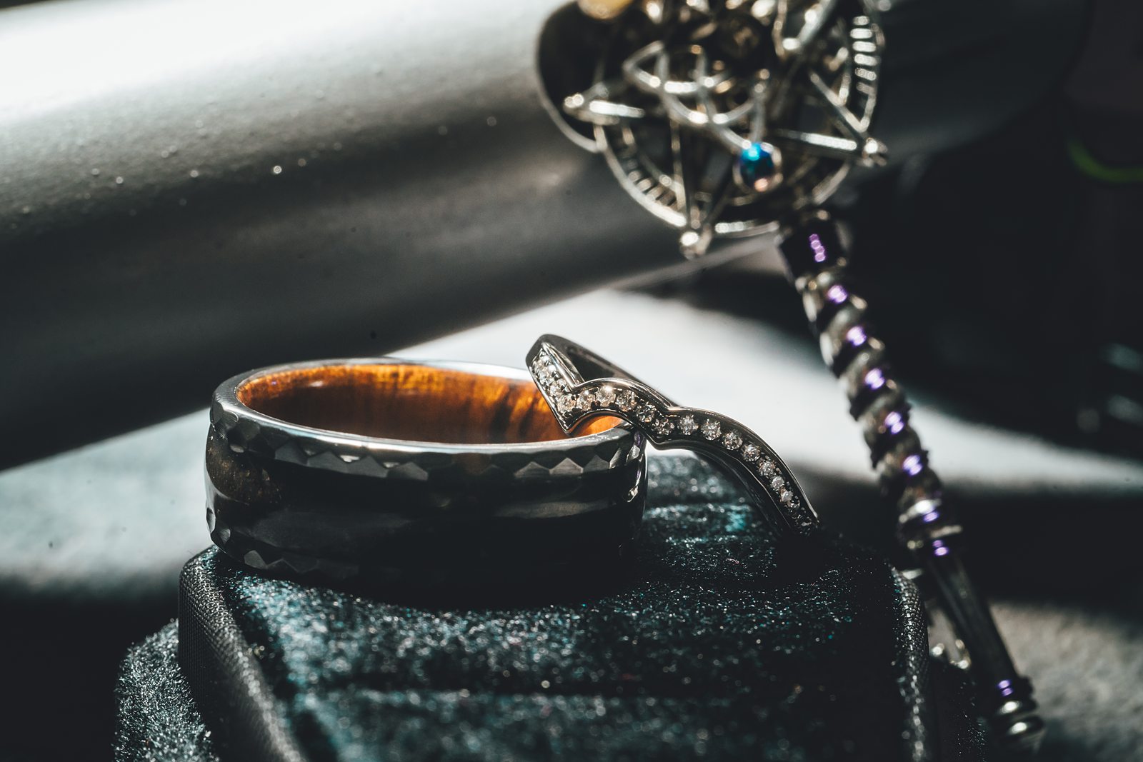Wedding rings with dark floral details and pendant
